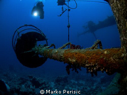 A diver descends towards one of the crows nest for a clos... by Marko Perisic 